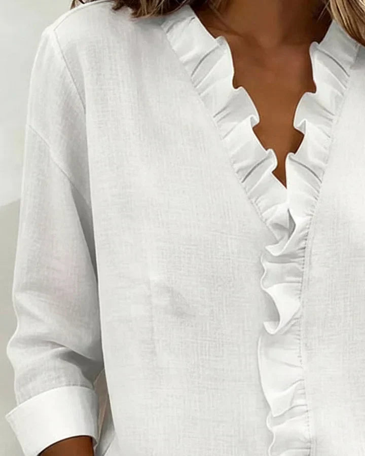 Irene | Elegant blouse with ruffles, V-neck, and long sleeves